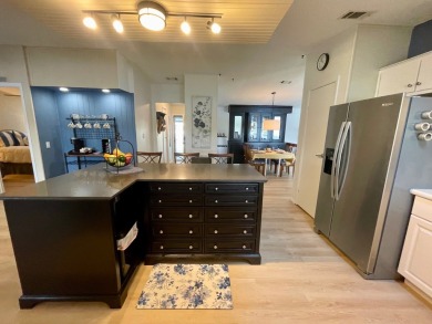 Come and ENJOY a Comfortable Serene Lifestyle ON THE WATER in a on Water Oak Country Club Estates in Florida - for sale on GolfHomes.com, golf home, golf lot