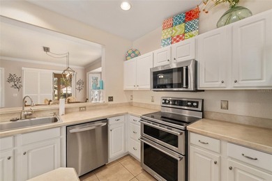 This bright and spacious Captiva model is now available in on Eagle Ridge At Spruce Creek Country Club in Florida - for sale on GolfHomes.com, golf home, golf lot