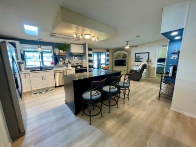 Come and ENJOY a Comfortable Serene Lifestyle ON THE WATER in a on Water Oak Country Club Estates in Florida - for sale on GolfHomes.com, golf home, golf lot
