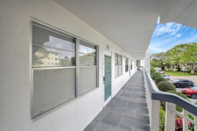 Charming 2-Bedroom, 2-Bathroom Condo in sought after Berkshire D on Hillsboro Pines Golf in Florida - for sale on GolfHomes.com, golf home, golf lot