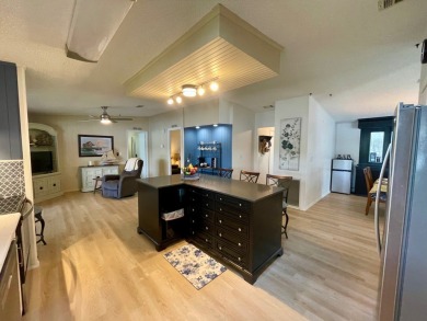 Come and ENJOY a Comfortable Serene Lifestyle ON THE WATER in a on Water Oak Country Club Estates in Florida - for sale on GolfHomes.com, golf home, golf lot