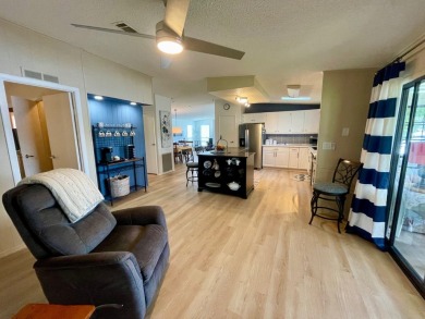 Come and ENJOY a Comfortable Serene Lifestyle ON THE WATER in a on Water Oak Country Club Estates in Florida - for sale on GolfHomes.com, golf home, golf lot