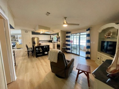 Come and ENJOY a Comfortable Serene Lifestyle ON THE WATER in a on Water Oak Country Club Estates in Florida - for sale on GolfHomes.com, golf home, golf lot