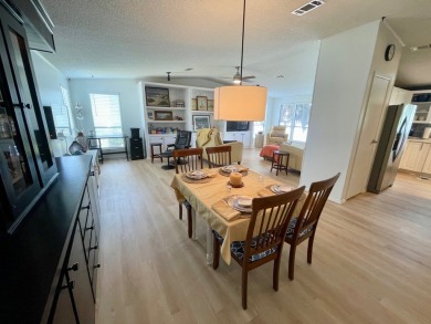 Come and ENJOY a Comfortable Serene Lifestyle ON THE WATER in a on Water Oak Country Club Estates in Florida - for sale on GolfHomes.com, golf home, golf lot