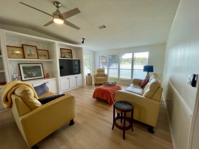 Come and ENJOY a Comfortable Serene Lifestyle ON THE WATER in a on Water Oak Country Club Estates in Florida - for sale on GolfHomes.com, golf home, golf lot