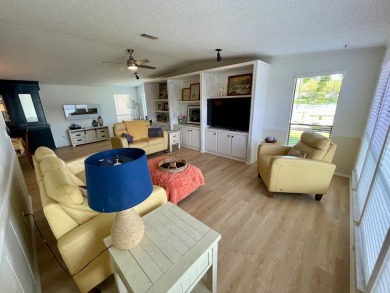 Come and ENJOY a Comfortable Serene Lifestyle ON THE WATER in a on Water Oak Country Club Estates in Florida - for sale on GolfHomes.com, golf home, golf lot