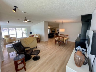 Come and ENJOY a Comfortable Serene Lifestyle ON THE WATER in a on Water Oak Country Club Estates in Florida - for sale on GolfHomes.com, golf home, golf lot