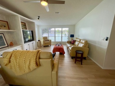 Come and ENJOY a Comfortable Serene Lifestyle ON THE WATER in a on Water Oak Country Club Estates in Florida - for sale on GolfHomes.com, golf home, golf lot