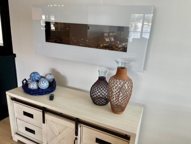 Come and ENJOY a Comfortable Serene Lifestyle ON THE WATER in a on Water Oak Country Club Estates in Florida - for sale on GolfHomes.com, golf home, golf lot
