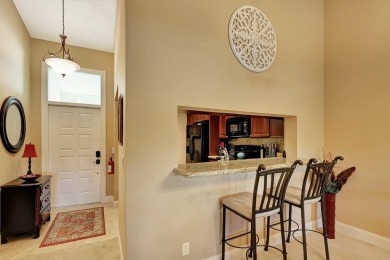 Located in the gated community of PGA National, this fully on PGA National Golf Club in Florida - for sale on GolfHomes.com, golf home, golf lot