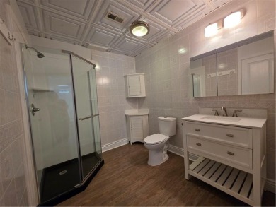 Nestled close to Dogwood Golf Course, this lovely end unit on Bella Vista Country Club and Golf Course in Arkansas - for sale on GolfHomes.com, golf home, golf lot