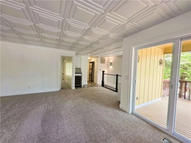 Nestled close to Dogwood Golf Course, this lovely end unit on Bella Vista Country Club and Golf Course in Arkansas - for sale on GolfHomes.com, golf home, golf lot