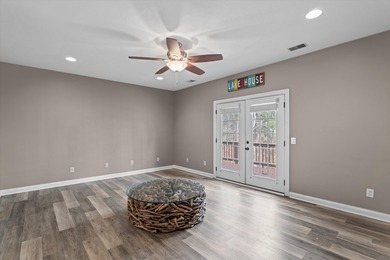 Waterfront home with a boat dock with a jetski dock on a deep on Monticello Golf Club At Savannah Lakes in South Carolina - for sale on GolfHomes.com, golf home, golf lot