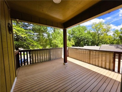 Nestled close to Dogwood Golf Course, this lovely end unit on Bella Vista Country Club and Golf Course in Arkansas - for sale on GolfHomes.com, golf home, golf lot