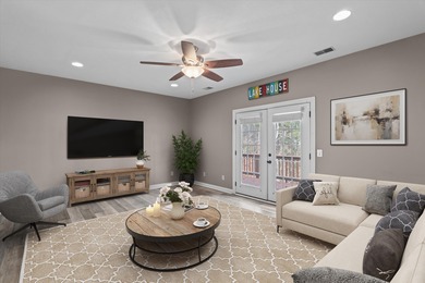 Waterfront home with a boat dock with a jetski dock on a deep on Monticello Golf Club At Savannah Lakes in South Carolina - for sale on GolfHomes.com, golf home, golf lot