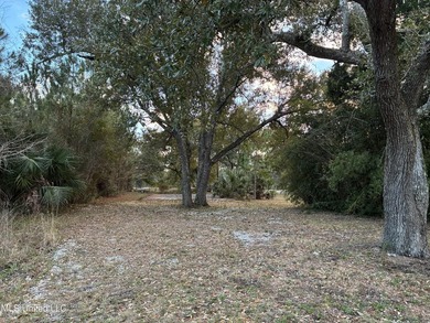 Your Gulf Coast Escape Awaits! Imagine waking up to the sound of on Pass Christian Isles Golf Club in Mississippi - for sale on GolfHomes.com, golf home, golf lot