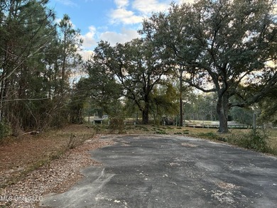 Your Gulf Coast Escape Awaits! Imagine waking up to the sound of on Pass Christian Isles Golf Club in Mississippi - for sale on GolfHomes.com, golf home, golf lot