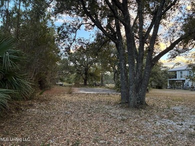 Your Gulf Coast Escape Awaits! Imagine waking up to the sound of on Pass Christian Isles Golf Club in Mississippi - for sale on GolfHomes.com, golf home, golf lot