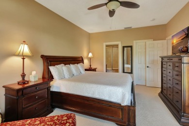 Located in the gated community of PGA National, this fully on PGA National Golf Club in Florida - for sale on GolfHomes.com, golf home, golf lot