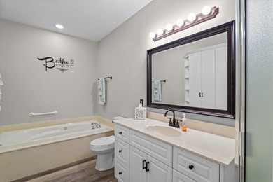 Waterfront home with a boat dock with a jetski dock on a deep on Monticello Golf Club At Savannah Lakes in South Carolina - for sale on GolfHomes.com, golf home, golf lot