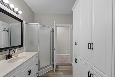 Waterfront home with a boat dock with a jetski dock on a deep on Monticello Golf Club At Savannah Lakes in South Carolina - for sale on GolfHomes.com, golf home, golf lot