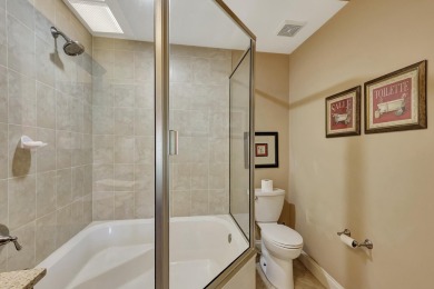 Located in the gated community of PGA National, this fully on PGA National Golf Club in Florida - for sale on GolfHomes.com, golf home, golf lot