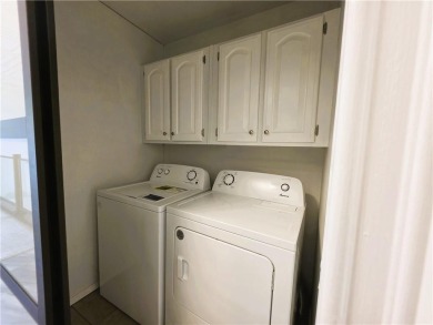 Nestled close to Dogwood Golf Course, this lovely end unit on Bella Vista Country Club and Golf Course in Arkansas - for sale on GolfHomes.com, golf home, golf lot