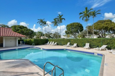Located in the gated community of PGA National, this fully on PGA National Golf Club in Florida - for sale on GolfHomes.com, golf home, golf lot