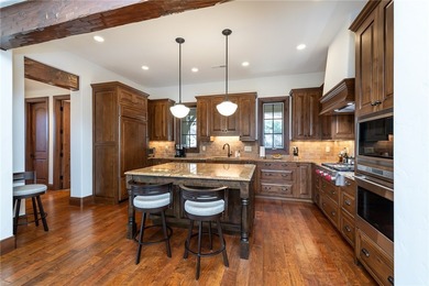 Your next chapter begins at 215 Long Ridge Road, an elegant on The Reserve At Lake Keowee in South Carolina - for sale on GolfHomes.com, golf home, golf lot