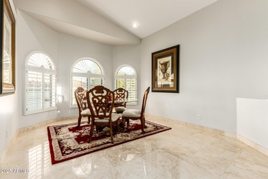 This stunning home is perfectly positioned on the Red Mountain on Red Mountain Ranch Country Club in Arizona - for sale on GolfHomes.com, golf home, golf lot