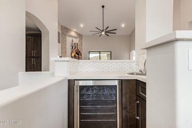 This stunning home is perfectly positioned on the Red Mountain on Red Mountain Ranch Country Club in Arizona - for sale on GolfHomes.com, golf home, golf lot