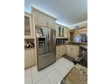 Welcome to this beautifully updated 2BR/2BA condo in the highly on Boca Dunes Golf and Country Club in Florida - for sale on GolfHomes.com, golf home, golf lot