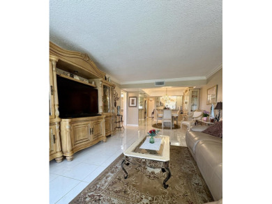 Welcome to this beautifully updated 2BR/2BA condo in the highly on Boca Dunes Golf and Country Club in Florida - for sale on GolfHomes.com, golf home, golf lot