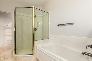 This stunning home is perfectly positioned on the Red Mountain on Red Mountain Ranch Country Club in Arizona - for sale on GolfHomes.com, golf home, golf lot