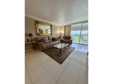 Welcome to this beautifully updated 2BR/2BA condo in the highly on Boca Dunes Golf and Country Club in Florida - for sale on GolfHomes.com, golf home, golf lot