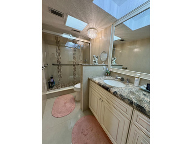 Welcome to this beautifully updated 2BR/2BA condo in the highly on Boca Dunes Golf and Country Club in Florida - for sale on GolfHomes.com, golf home, golf lot