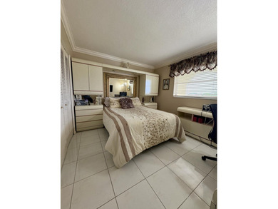 Welcome to this beautifully updated 2BR/2BA condo in the highly on Boca Dunes Golf and Country Club in Florida - for sale on GolfHomes.com, golf home, golf lot
