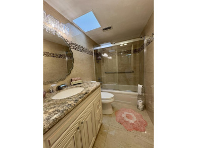 Welcome to this beautifully updated 2BR/2BA condo in the highly on Boca Dunes Golf and Country Club in Florida - for sale on GolfHomes.com, golf home, golf lot