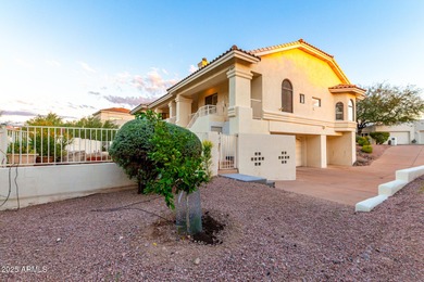 This stunning home is perfectly positioned on the Red Mountain on Red Mountain Ranch Country Club in Arizona - for sale on GolfHomes.com, golf home, golf lot