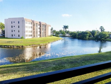 Welcome to serene lake views from this charming 2-bedroom, 1.5 on Sunrise Lakes Phase IV Golf Course in Florida - for sale on GolfHomes.com, golf home, golf lot