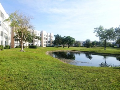 Welcome to serene lake views from this charming 2-bedroom, 1.5 on Sunrise Lakes Phase IV Golf Course in Florida - for sale on GolfHomes.com, golf home, golf lot