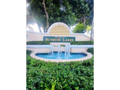 Welcome to serene lake views from this charming 2-bedroom, 1.5 on Sunrise Lakes Phase IV Golf Course in Florida - for sale on GolfHomes.com, golf home, golf lot