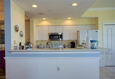 Peaceful water views abound in this third-floor condo on Heritage Palms Golf and Country Club in Florida - for sale on GolfHomes.com, golf home, golf lot