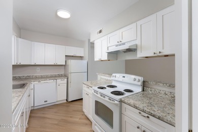 Welcome to this updated 2-bedroom, 2-bathroom ground floor condo on Belvedere Country Club in North Carolina - for sale on GolfHomes.com, golf home, golf lot