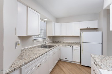 Welcome to this updated 2-bedroom, 2-bathroom ground floor condo on Belvedere Country Club in North Carolina - for sale on GolfHomes.com, golf home, golf lot