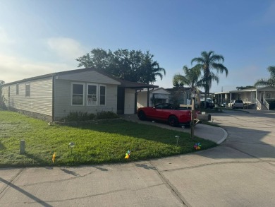 Here's a little slice a peace and happiness! Located on a on Golden Lakes Golf Course in Florida - for sale on GolfHomes.com, golf home, golf lot