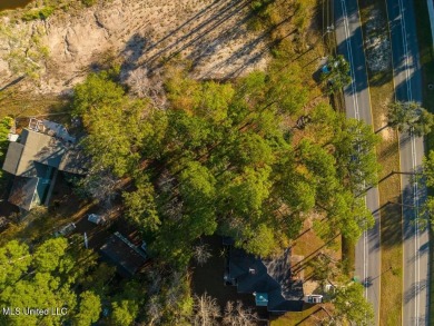 Partially Wooded Lot with 92 feet of road frontage and amazing on Diamondhead Country Club in Mississippi - for sale on GolfHomes.com, golf home, golf lot