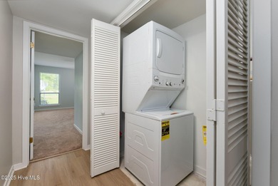 Welcome to this updated 2-bedroom, 2-bathroom ground floor condo on Belvedere Country Club in North Carolina - for sale on GolfHomes.com, golf home, golf lot