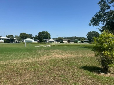 Here's a little slice a peace and happiness! Located on a on Golden Lakes Golf Course in Florida - for sale on GolfHomes.com, golf home, golf lot