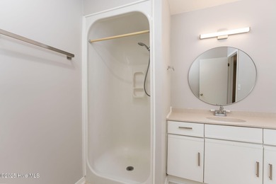 Welcome to this updated 2-bedroom, 2-bathroom ground floor condo on Belvedere Country Club in North Carolina - for sale on GolfHomes.com, golf home, golf lot